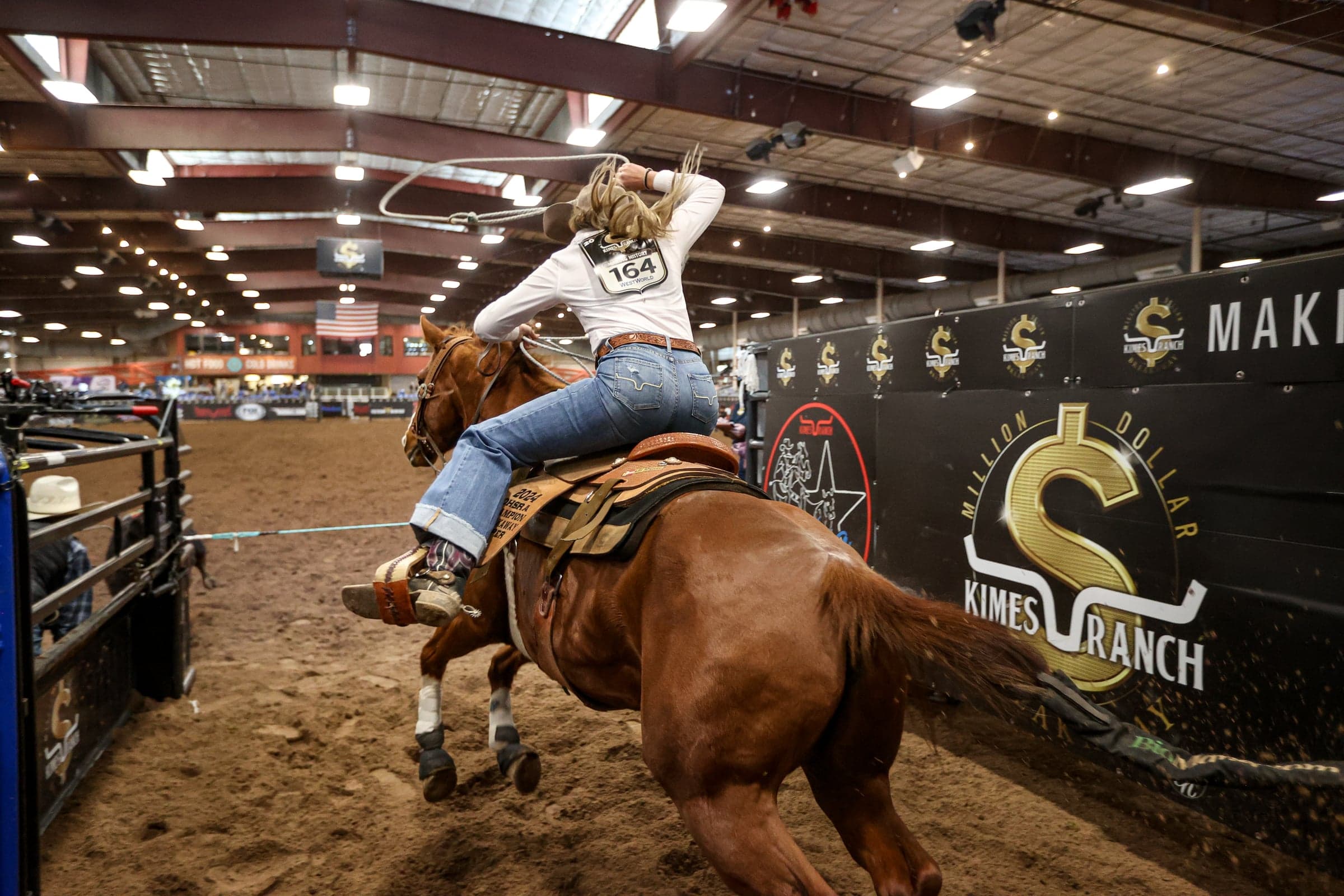Breakaway roper catching a calf at the Million Dollar Breakaway