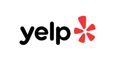 Minimalist red abstract flower on black background with five symmetrical petals.