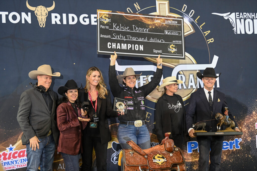 Rodeo champion wins $625K, celebrates with team at event.